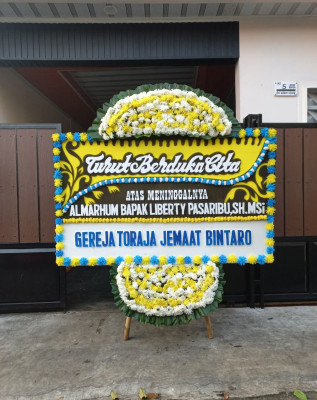 Papan Bunga Duka di Batang Alai Utara
